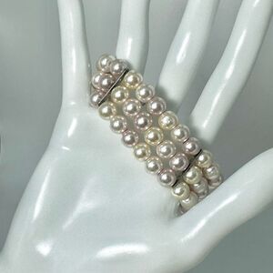Faux pearl triple strand stretchy bracelet